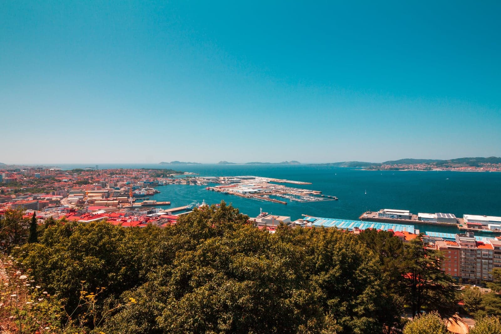 “Aerial panoramic view of Vigo port, Spain, showcasing vibrant cityscape and blue sea under a clear sky.” by vjgalaxy, via Pexels, used under the Pexels License.